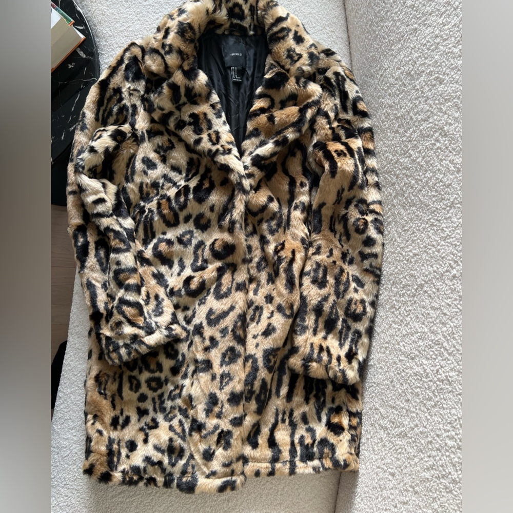 Leopard print above the knee faux fur coat. Excellent condition.